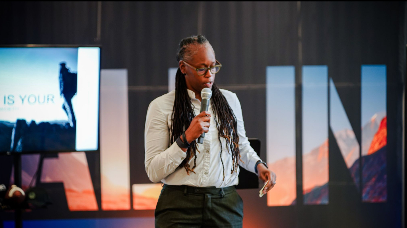 Carlai Moore speaking at a conference